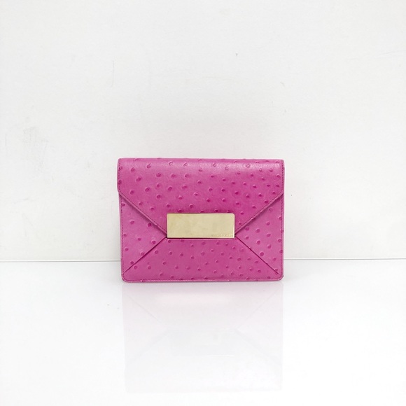 MICHAEL KORS COLLECTION Gia Clutch - Picture 1 of 3